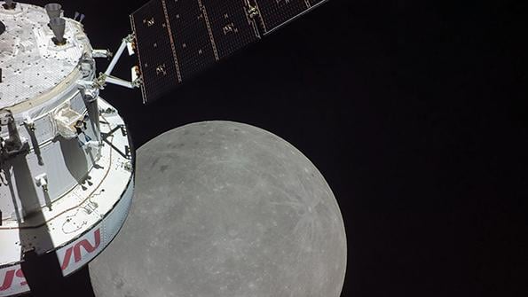 view of moon from camera on the uncrewed Orion spacecraft