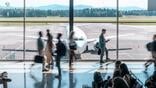 airport terminal with passenger plane on runway