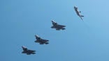 Lockheed Martin F-35As flying in formation