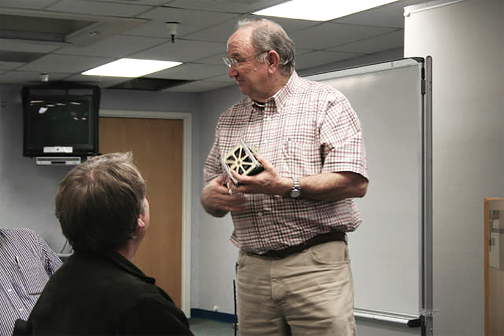 Bob Twiggs holding nanosatellite