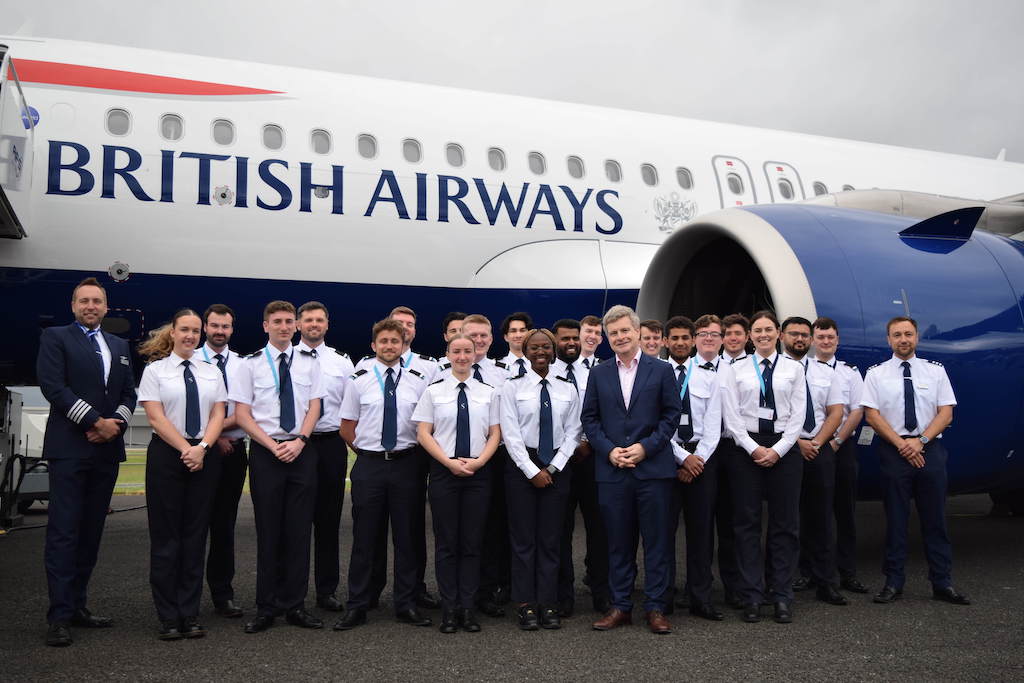 BA CEO Sean Doyle and pilot trainees in front of a BA aircraft.