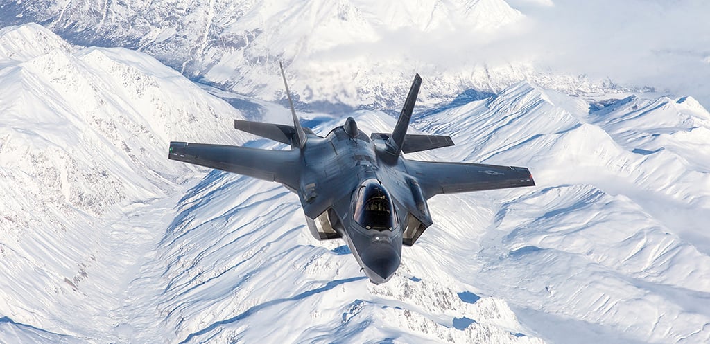 F-35A over snow-covered terrrain