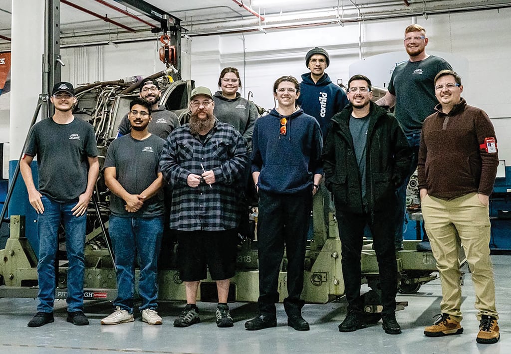 Epic Flight Academy&rsquo;s 2026 AMC student team from EVB, Mike Azarian (in plaid shirt)