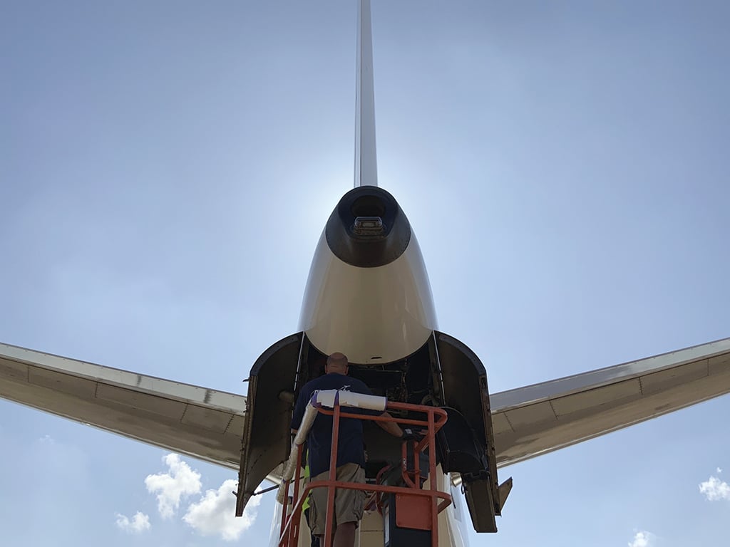 aircraft technician working on aircraft