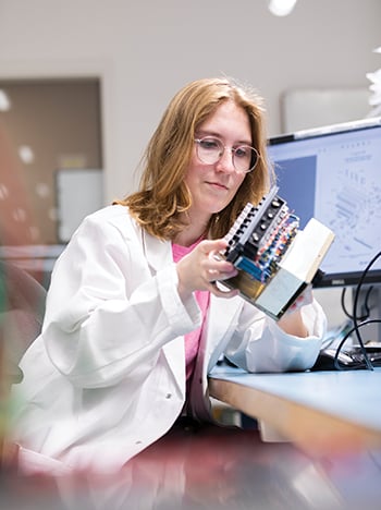 researcher performing inspection