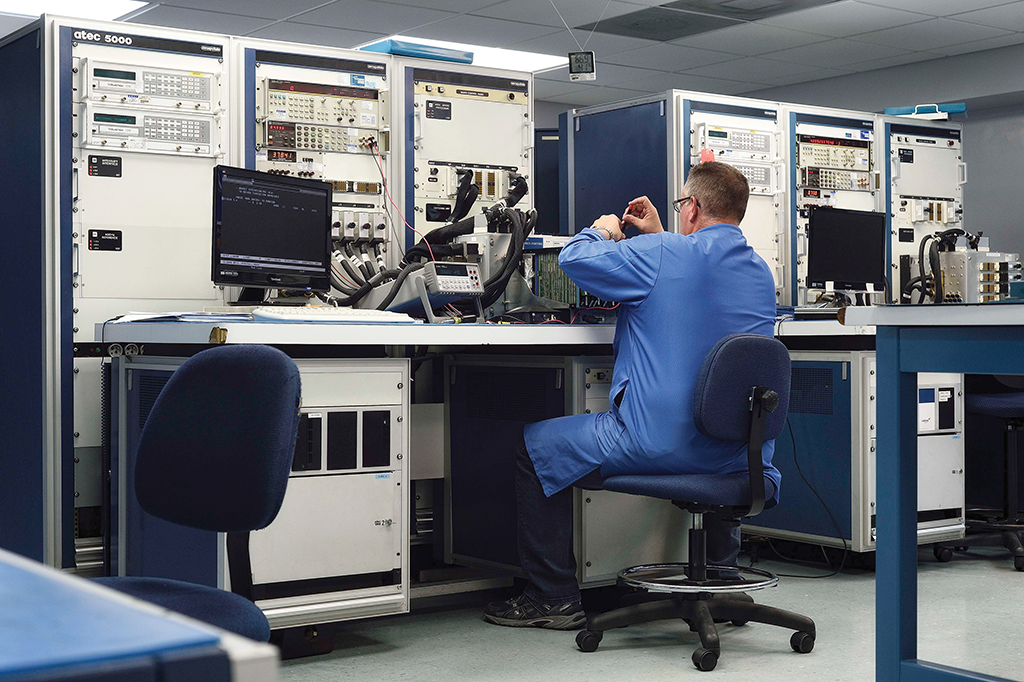 lab technician working on hardware