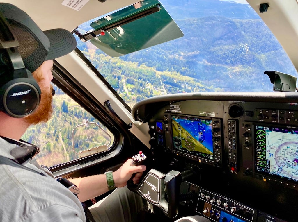 Daher's Zachary Wilkinson pilots the Kodiak 900 over Idaho terrain