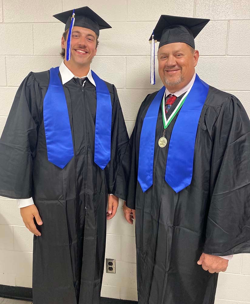 Cole and Micheal McDaniel at their graduation ceremony