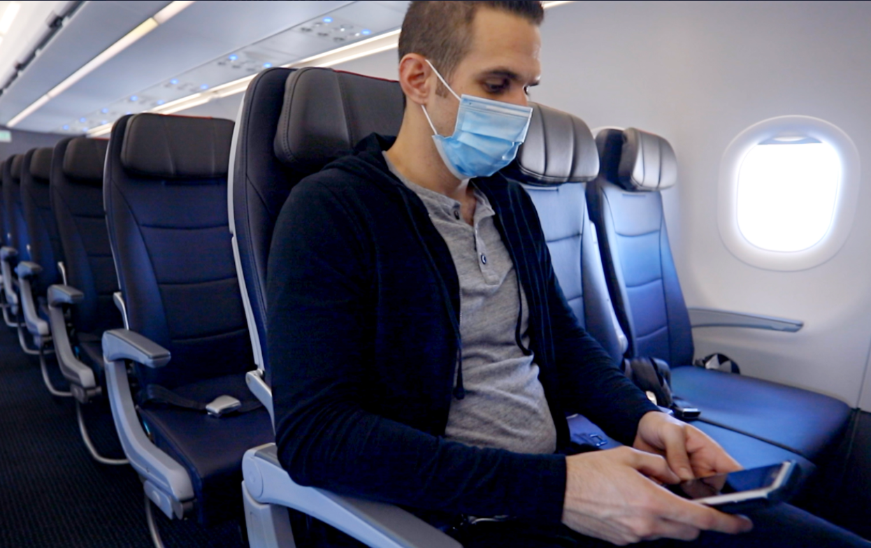 American Airlines passenger with mask