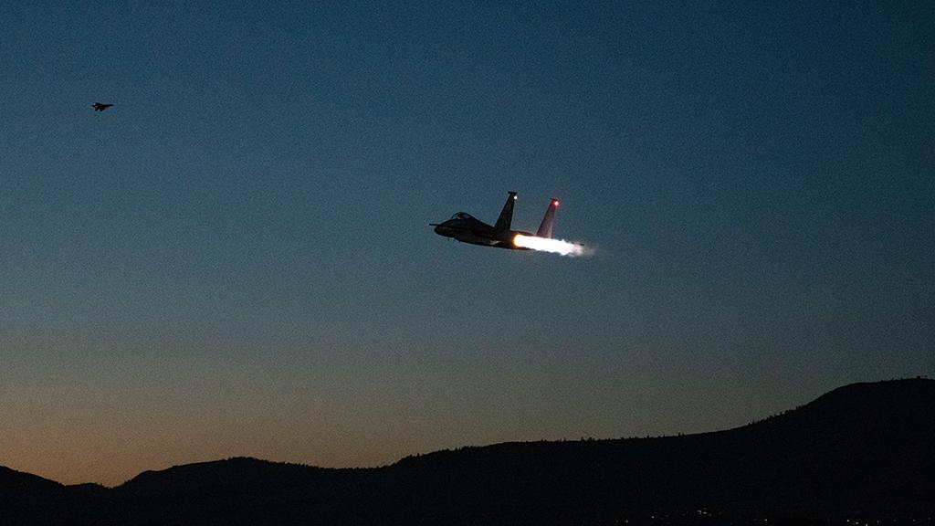 F-15 in flight at night