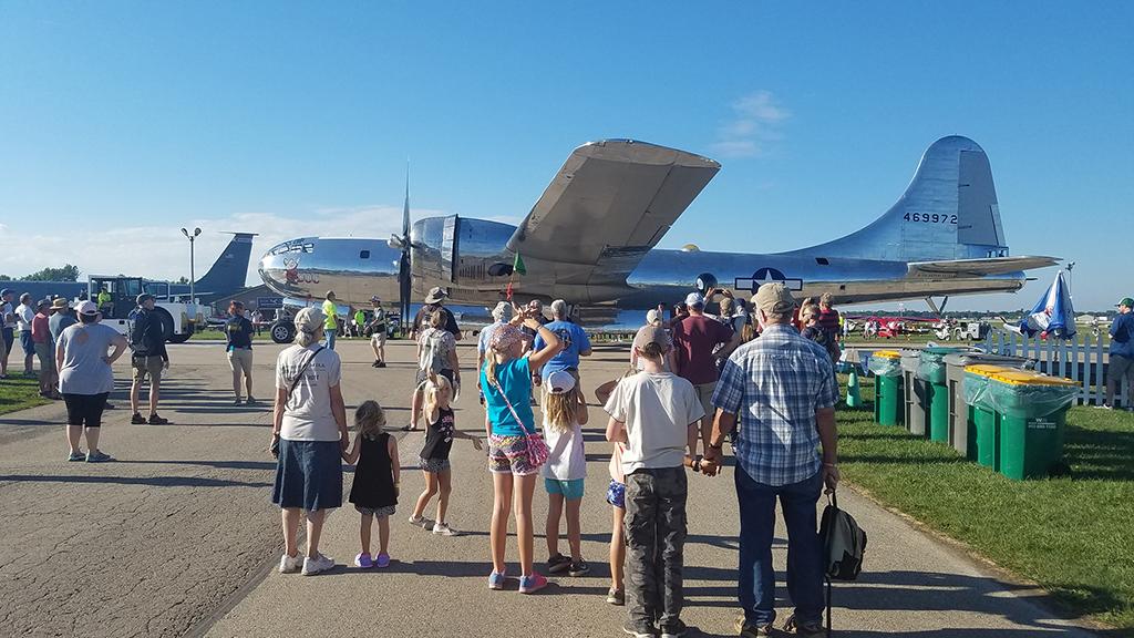 Oshkosh attendees looking at Doc