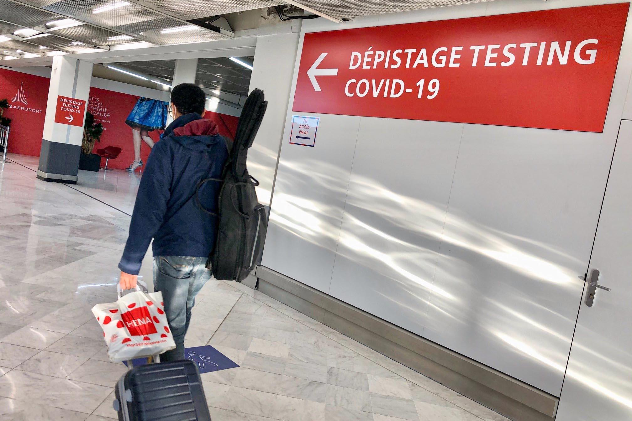 Paris Orly Airport sign to COVID-19 screening area 