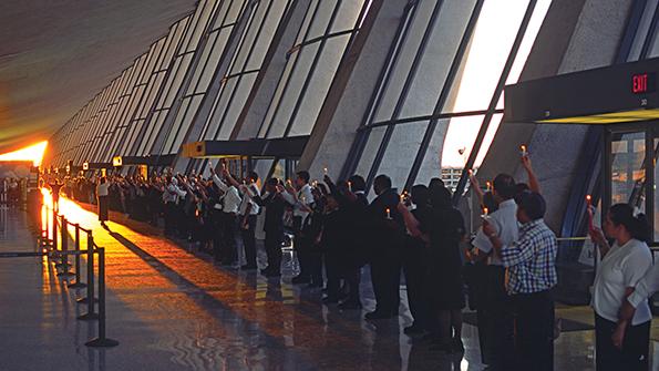 candlelight vigil at  Dulles International Airport