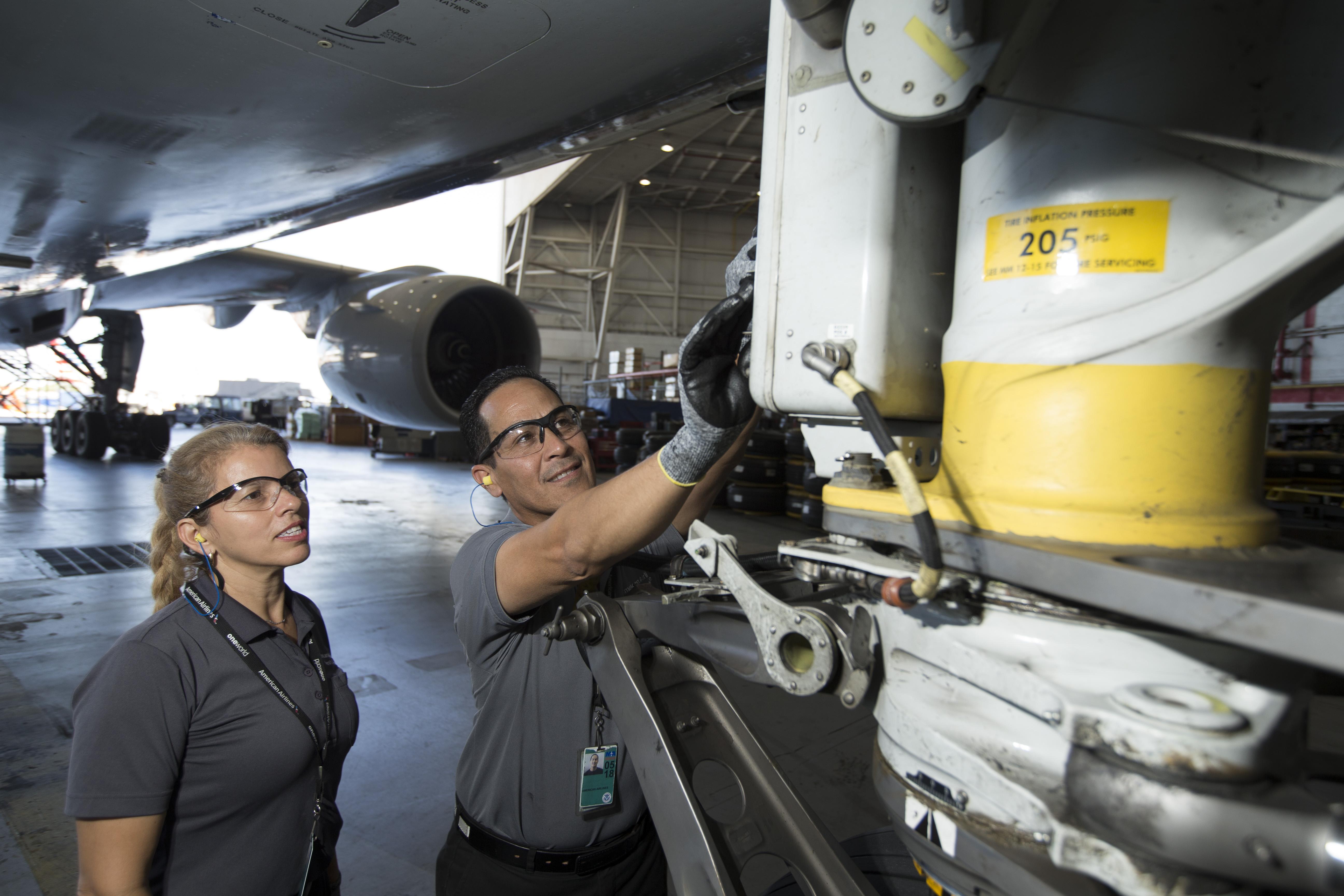 American Airlines maintenance checking aircraft