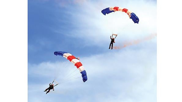 two parachuters in air