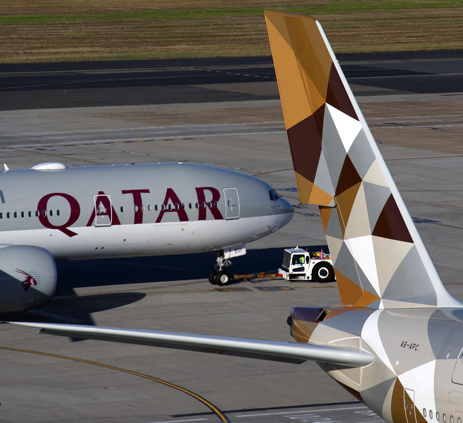 Qatar and Etihad aircraft