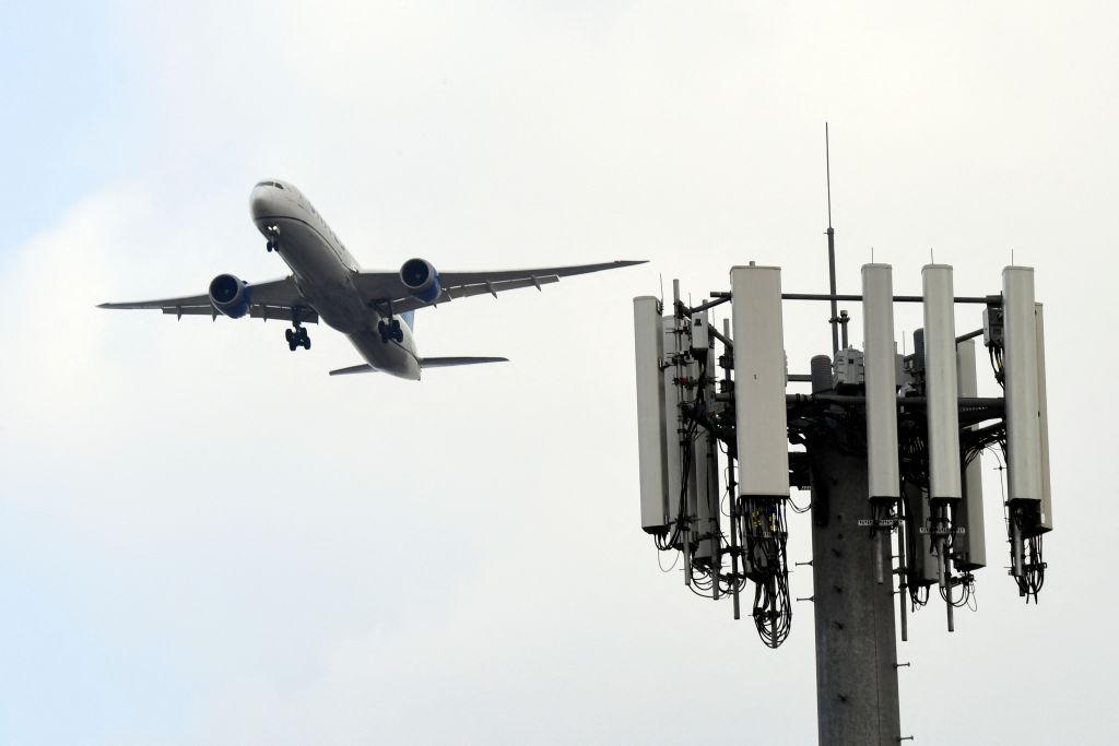 plane and 5G tower