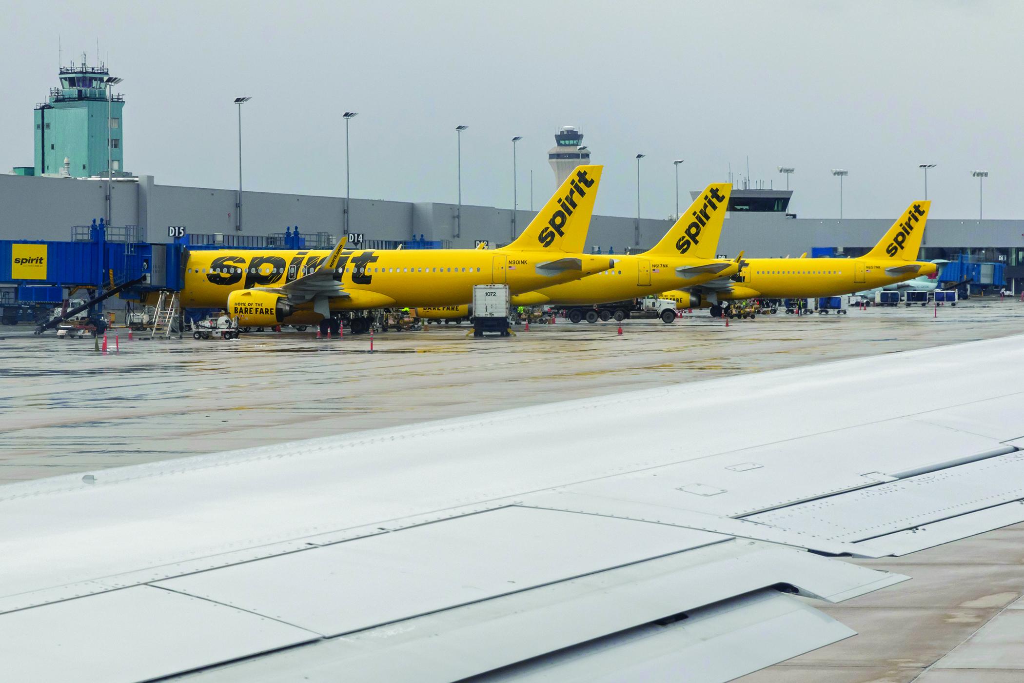 Spirit aircraft parked at airport