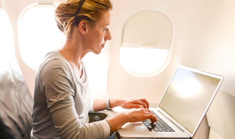 passenger using laptop