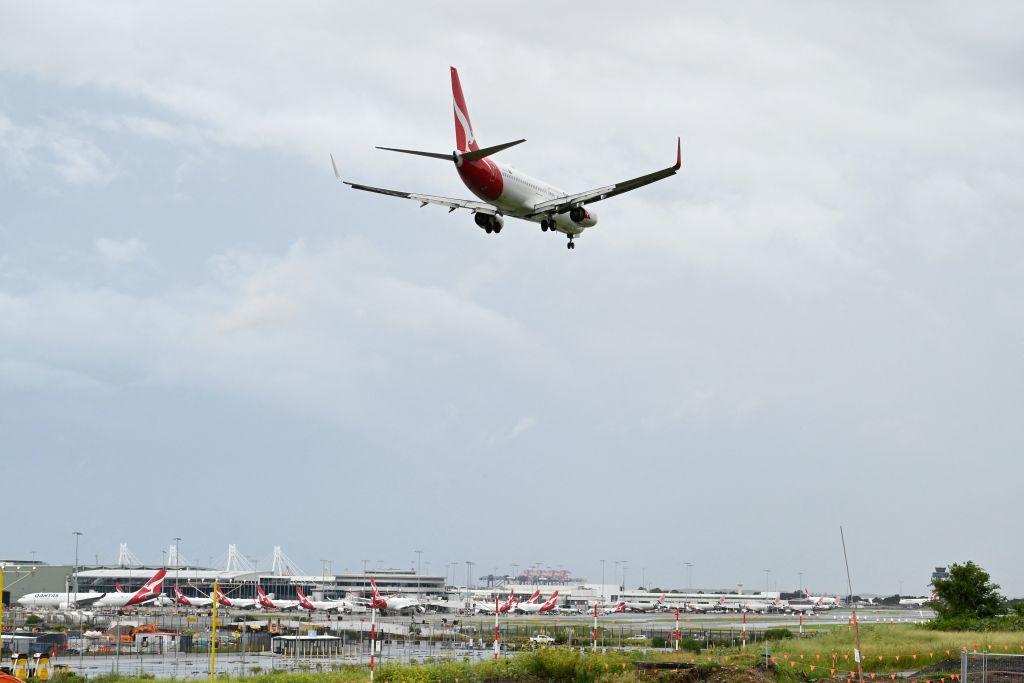 Qantas jet landing at Sydney Airport