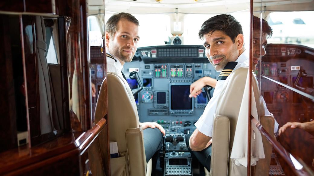 Charter flight pilots in cockpit