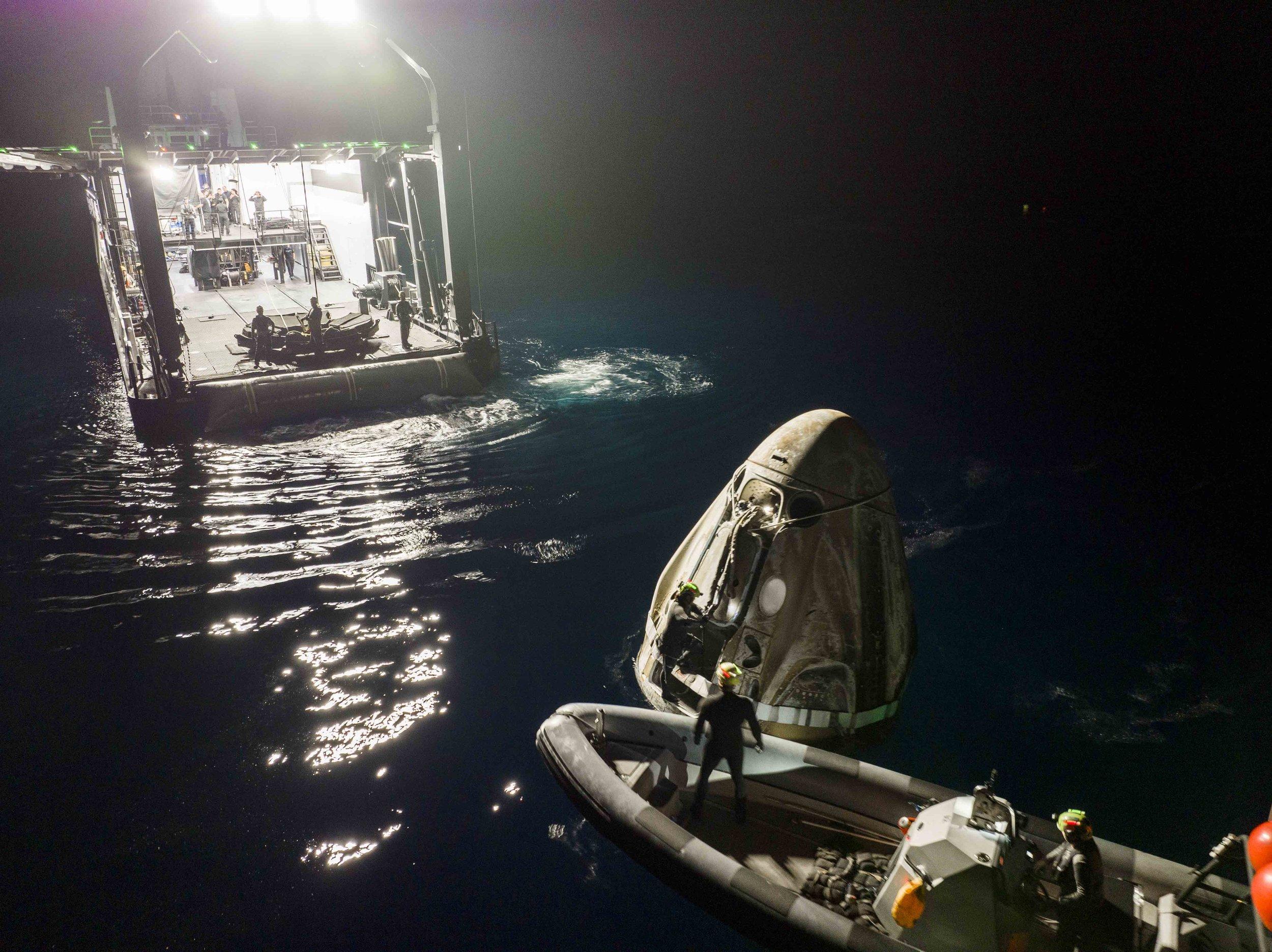 SpaceX Dragon capsule splashdown recovery Ax-2