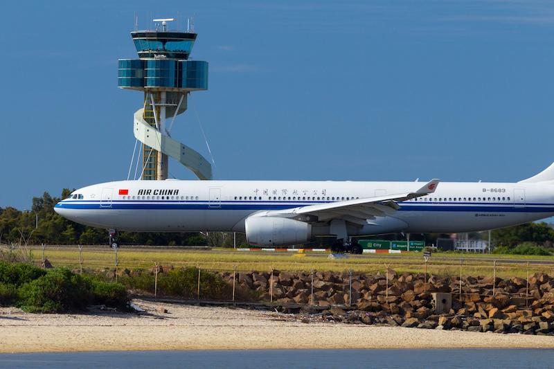 air china jet at Sydney airport control tower