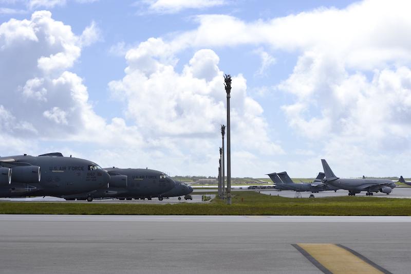 U.S. Air Force C-17s, left, along with a Royal Air Force Voyager and other international aircraft at Andersen Air Force Base, Guam