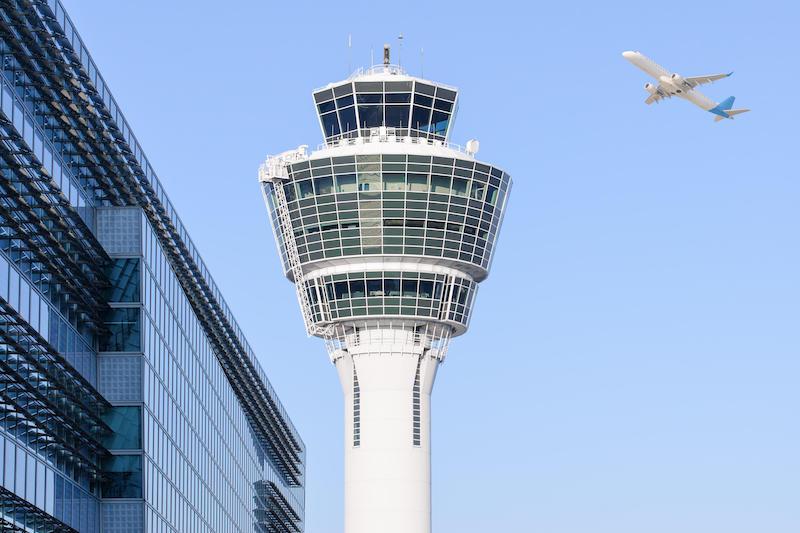 Munich atc tower with plane