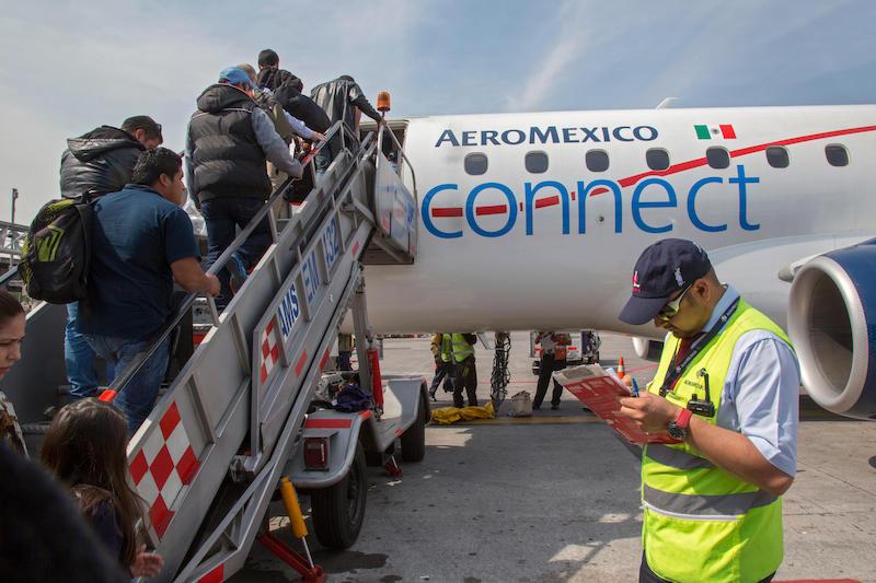 passengers boarding Aeromexico flight