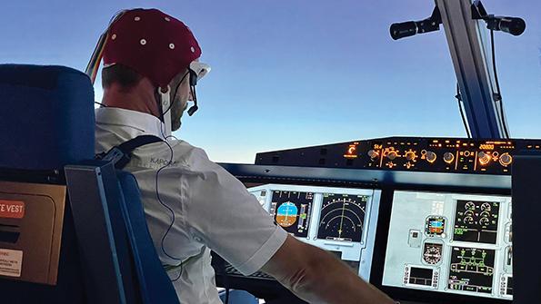 Pilot operating aircraft with brain-computer interface