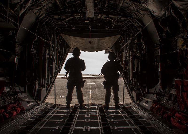 U.S. security forces on a C-130 at an undisclosed location in the Middle East. 