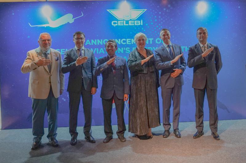 Celebi Aviation and PTN officials celebrating merger
