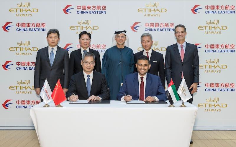 Officials from both airlines signing the agreement at Etihad’s headquarters in Abu Dhabi.