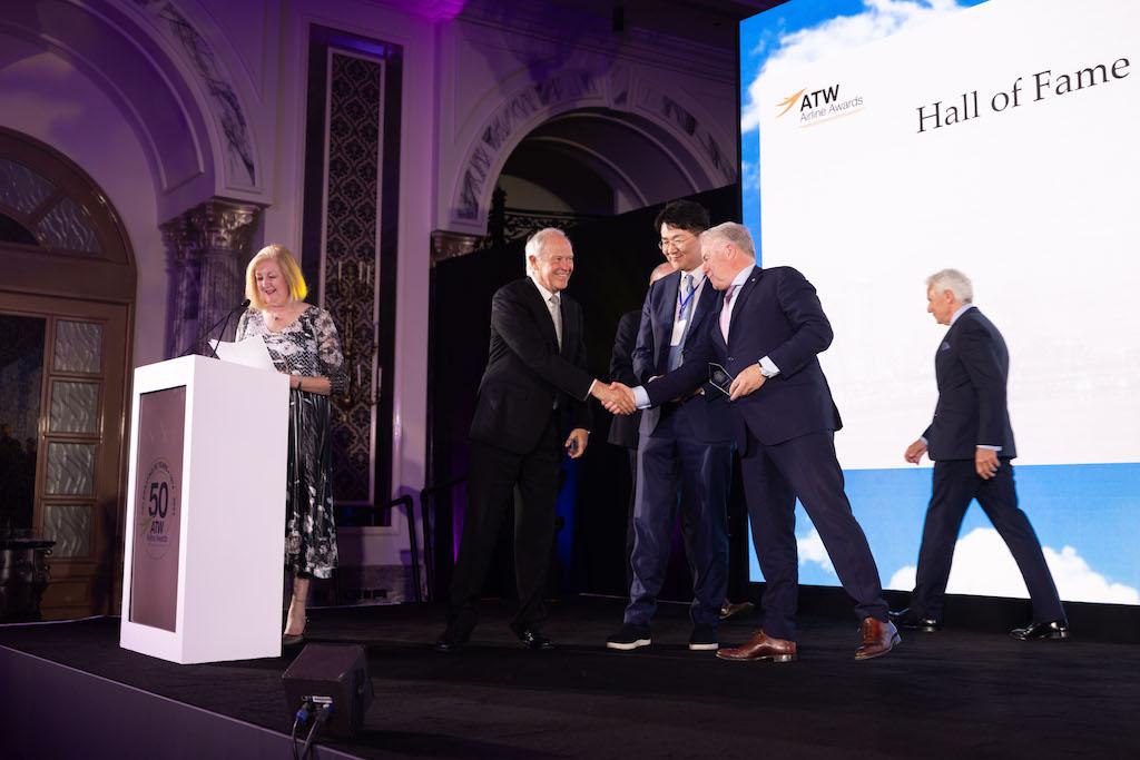 James Hogan shaking hands with Sir Tim Clark