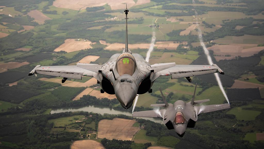 Dassault Rafale flying over Lockheed Martin F-35