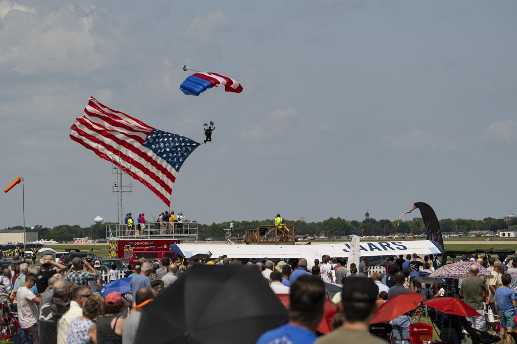 Sky diver with flag