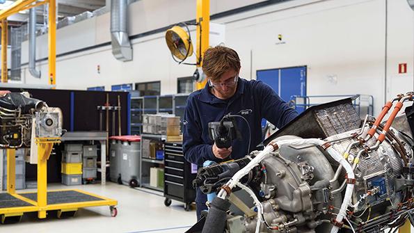 EPCOR technician repairing APU at its shop in the Netherlands