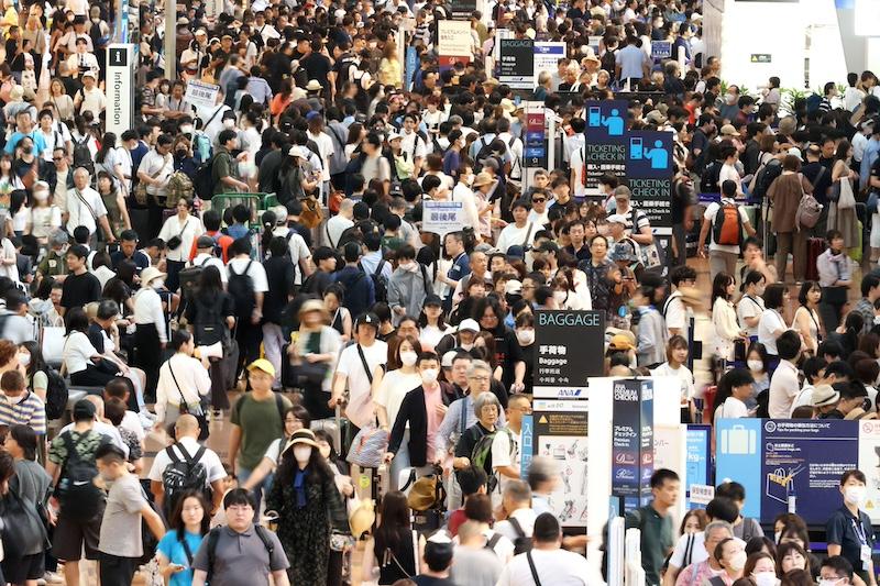 Passengers at Tokyo Haneda Airport