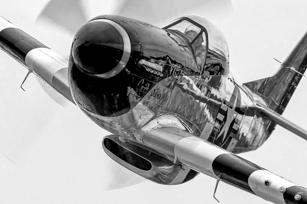 Scott Yoak, in his P-51D "Quick Silver," turns into a corner marker at the 2023 Warbirds Over Monroe Air Show in North Carolina.