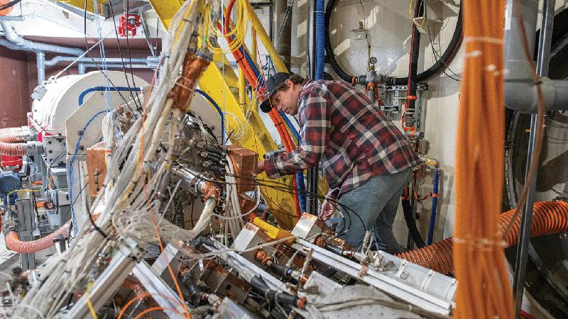 engineer working on testbed