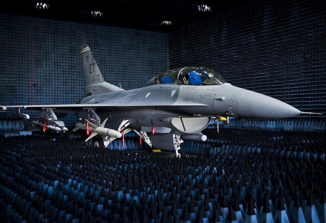 An F-16 is loaded for a suppression of enemy air defenses mission.