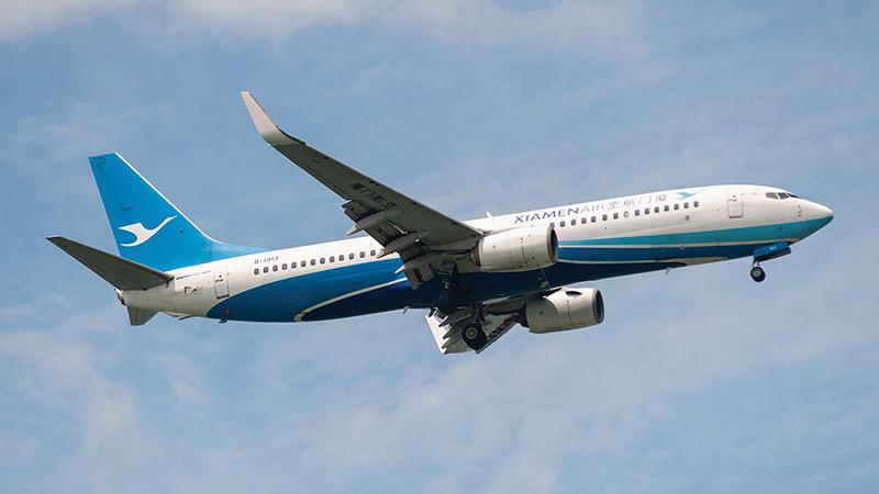 Xiamen Air Boeing 737-800 flying through sky