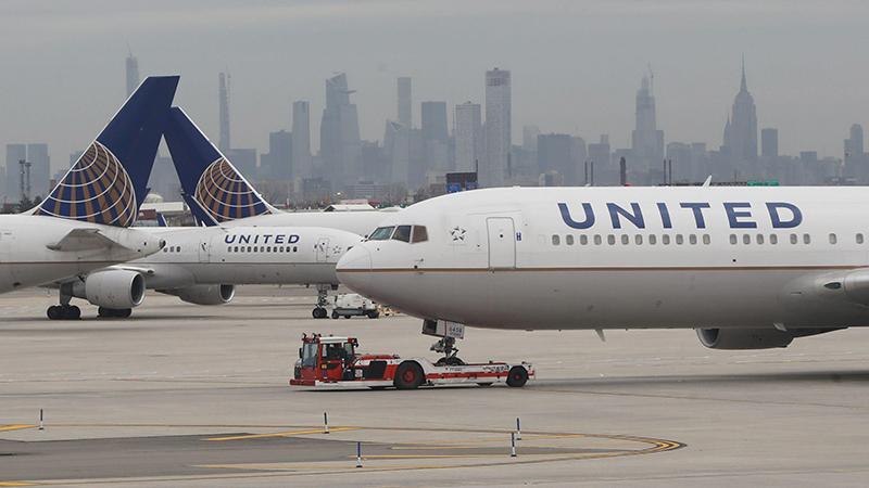 United Airlines aircraft on runway at Newark International Airport