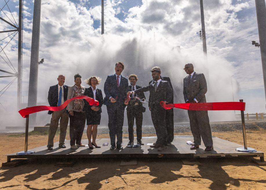 Virginia Gov. Glenn Youngkin cutting the ribbon on the state's newest launch pad on Wallops Island with state and Rocket Lab leaders, Aug. 28, 2025.