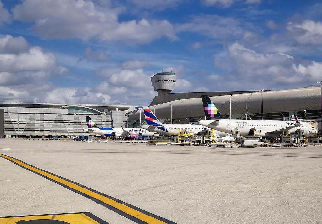 Volaris and LATAM aircraft parked at Miami International Airport