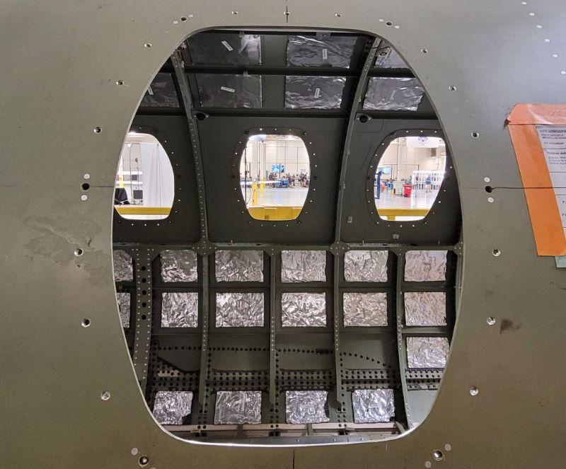 photo taken through the window of an aircraft fuselage