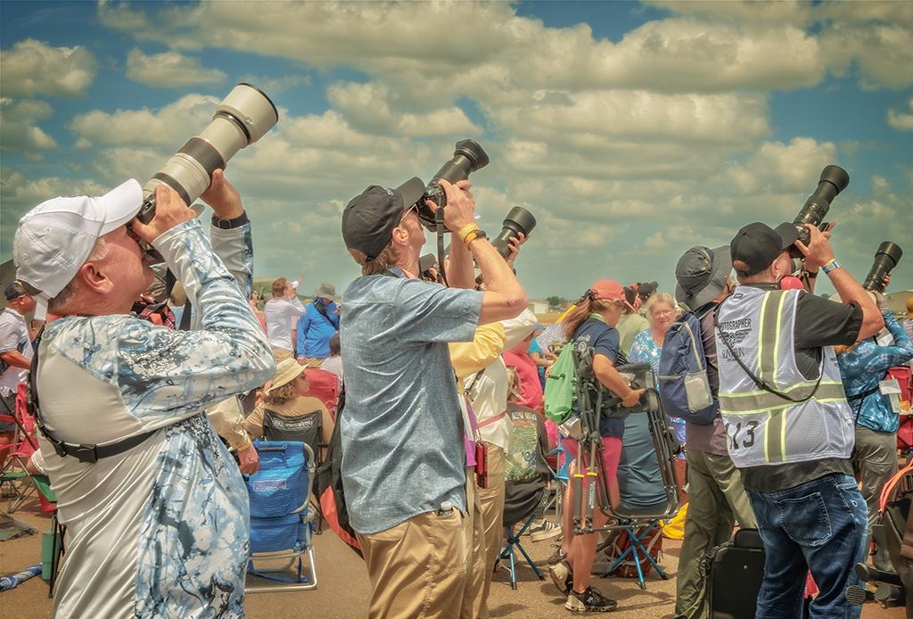 photographers shooting air show
