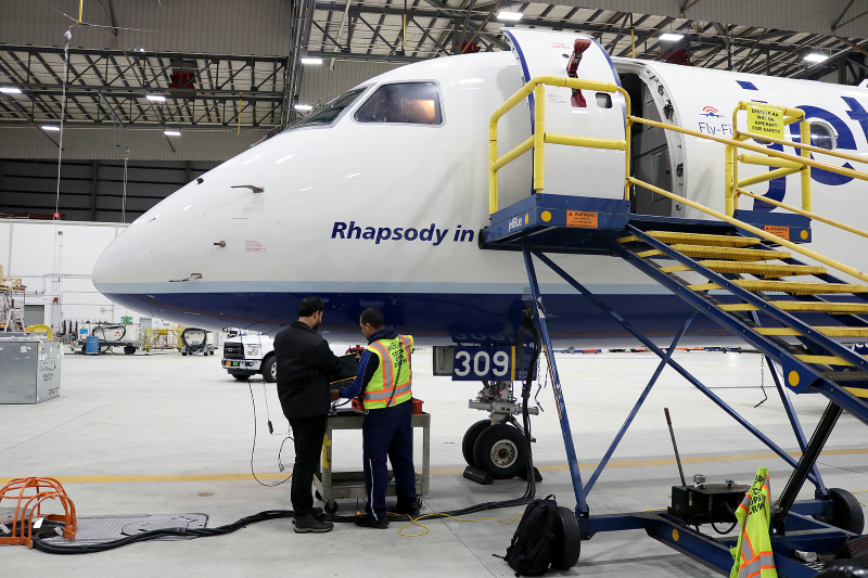 Jetblue aircraft in a hangar