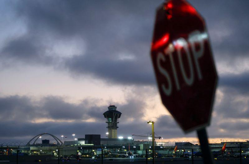LAX airport and a stop sign